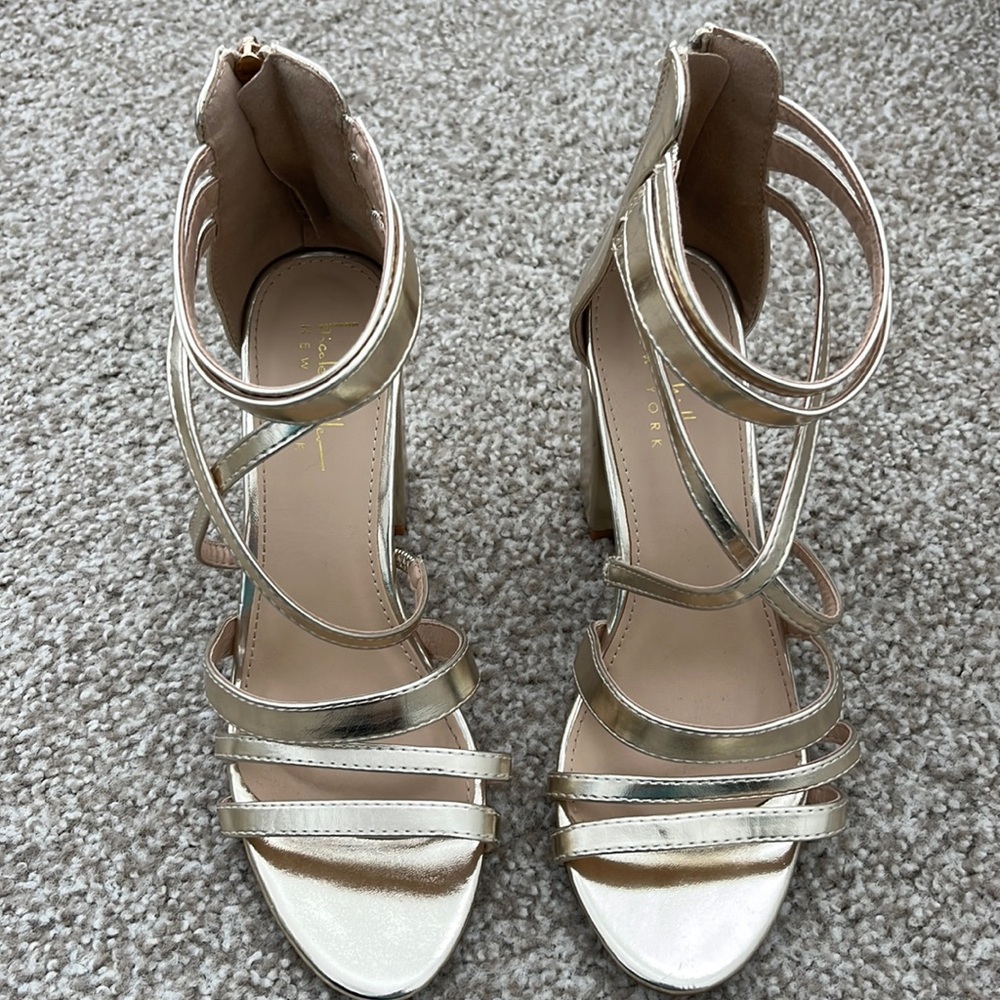 Never worn Nicole Miller “Uman” shoes.